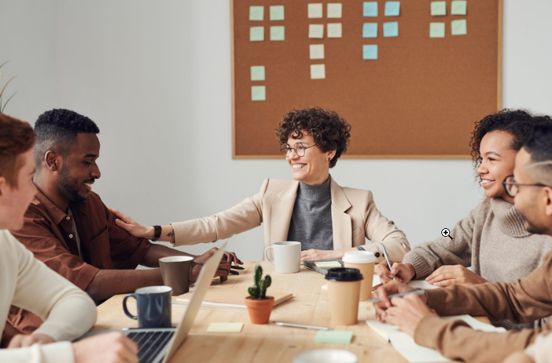 employees in a meeting soft skills